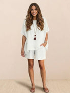 Comfy linen-like shirt and shorts two-piece set in breathable fabric for casual and versatile style