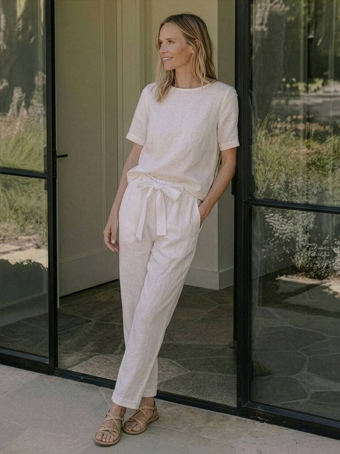 woman wearing breathable cotton linen set monochrome two-piece outfit
