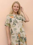 Woman wearing relaxed fit 100% cotton linen set in monochrome tones with breathable fabric and adjustable waist pants