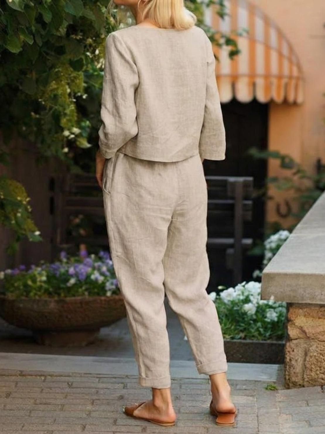 Cotton-linen monochrome capsule outfit with relaxed longline top and wide-leg pants in neutral tones