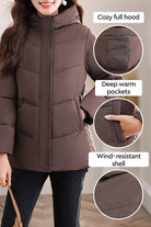 Everyday Warmth Coat mid-length hooded coat with cozy hood, deep warm pockets, and wind-resistant shell in brown.