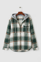 Highland Plaid Shacket with green and white plaid pattern, fleece lining, attached grey hood, button-front closure, and chest pocket.
