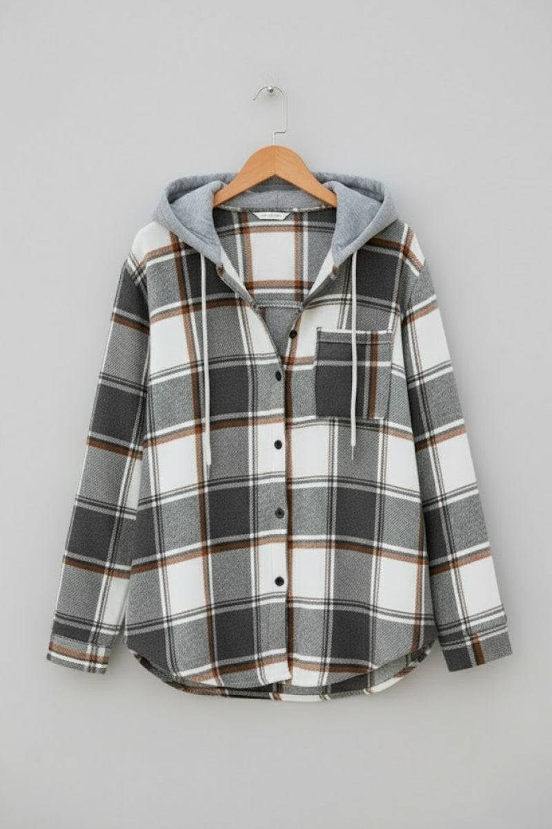 Highland Plaid Shacket with soft fleece lining, attached hood, button-front, and front pocket in gray and white plaid pattern.