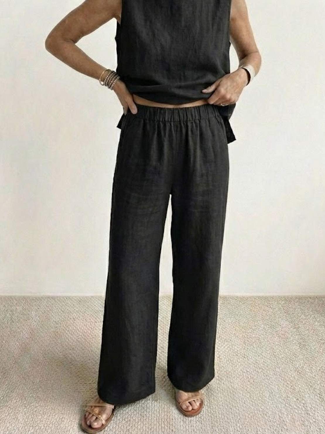 loose solid color sleeveless two-piece set with oversized fit and breathable cotton blend fabric