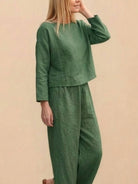 Loose solid color two-piece set in breathable green fabric with a relaxed fit for women