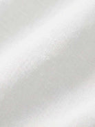 woman wearing loose solid color two-piece set with round-neck pullover and wide-leg pants