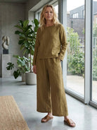 Loose solid color two-piece set with breathable cotton blend fabric for comfortable everyday wear