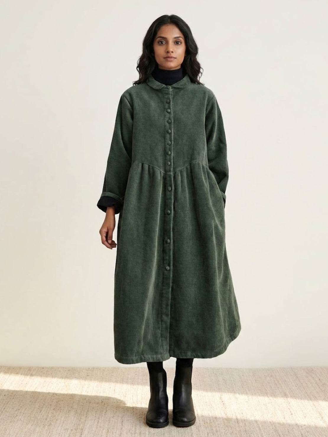 Oversized vintage corduroy coat in warm earth tones with classic fit and rich texture