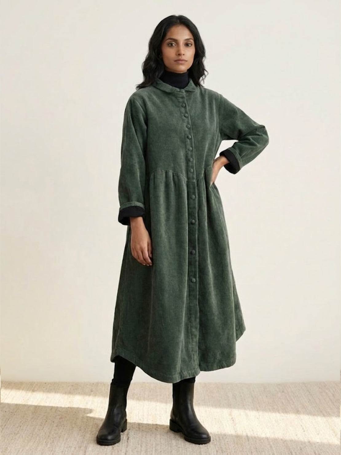 Oversized vintage corduroy coat in warm earth tones with classic fit and rich texture