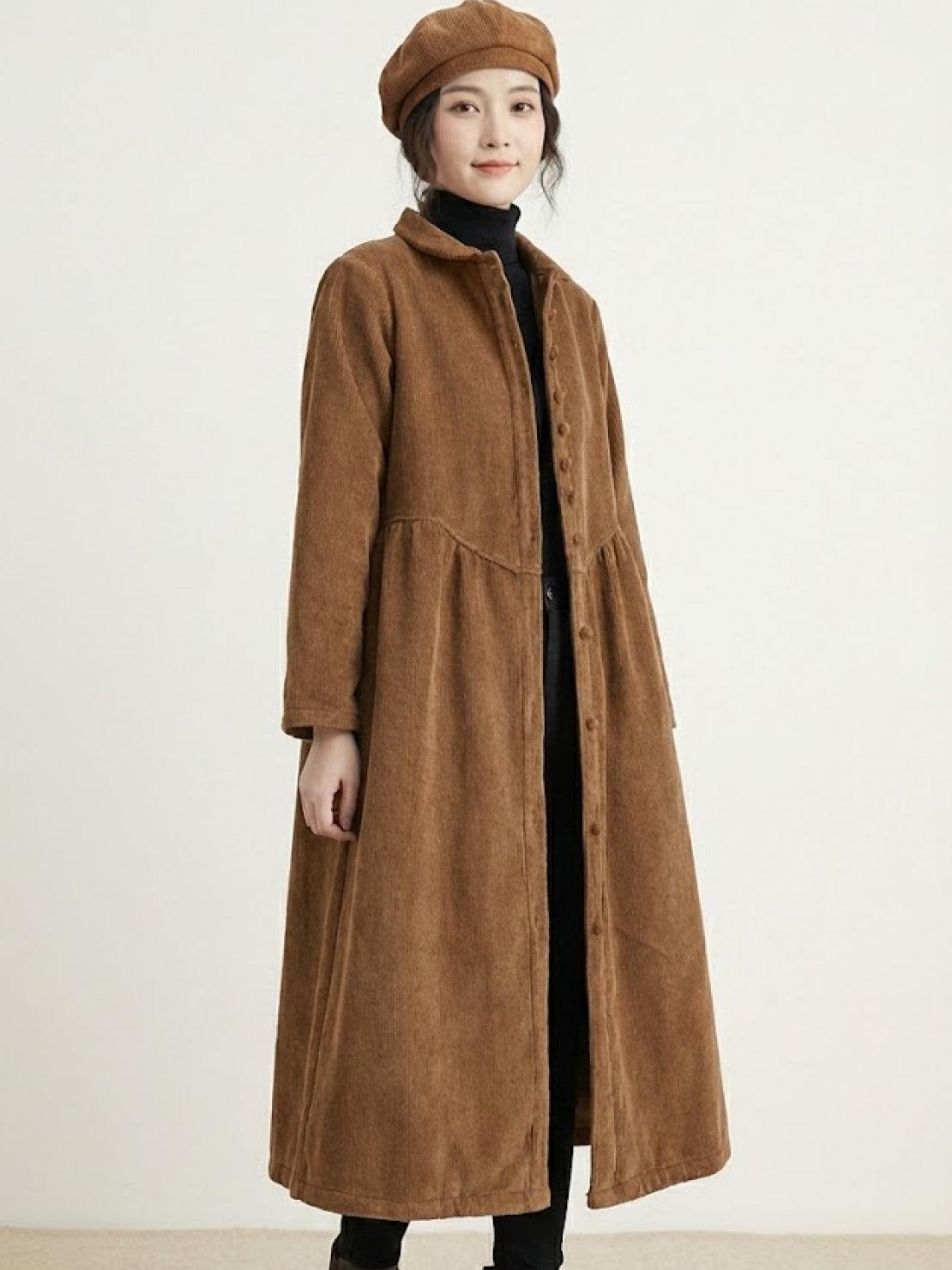 Oversized vintage corduroy coat in warm earth tones with classic oversized fit and rich texture