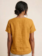 Relaxed Fit Linen Button-Up Tee with breathable cotton fabric and stylish button detail