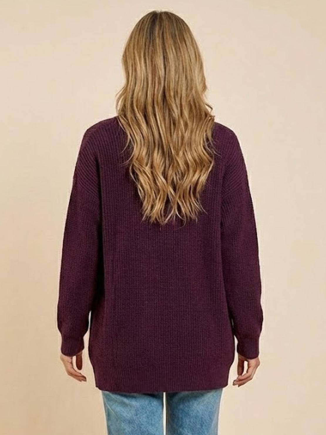 Relaxed fit oversized purple knitwear cardigan on woman from back view