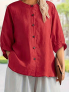 Relaxed loose breathable linen blouse in vibrant red with button-down front and 3/4 sleeves