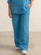 Model wearing oversized 100% cotton shirt and wide-leg pants co-ord set in relaxed fit