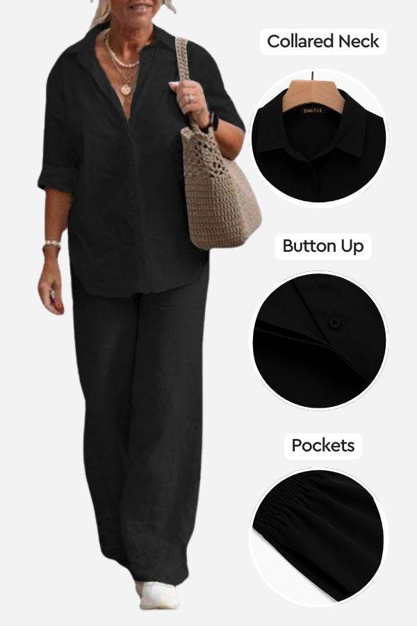 Woman wearing black relaxed shirt and trousers two-piece set with collared neck, button-up front, and pockets, styled casual and comfortable