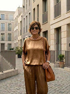 Silken Escape Satin Two-Piece Set with wide-leg pants and slim top in silky wrinkle-resistant fabric