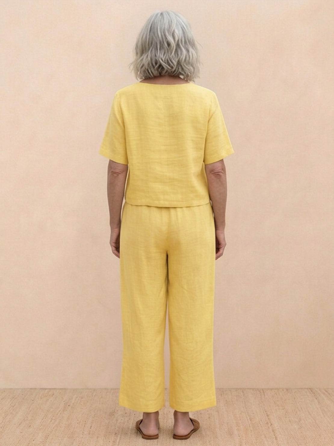 Loose fit co-ord set featuring a soft-tailored top and wide-leg bottoms in breathable fabric.