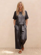 woman wearing loose fit Meadow co-ord set with short sleeves and wide-leg trousers