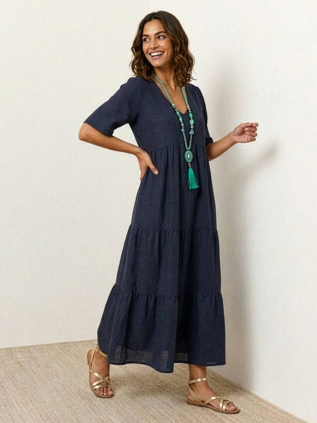 V-neck two-tiered maxi swing dress in flowing cotton fabric with irregular hemline and draped sleeves