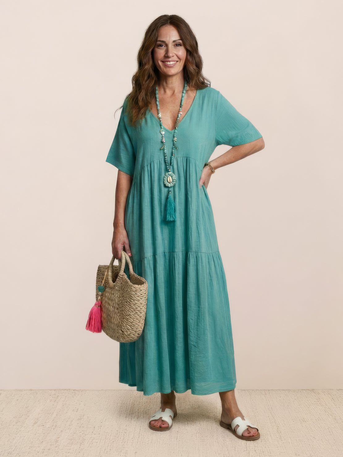 V-neck two-tiered maxi swing dress in flowing cotton fabric with irregular hemline and loose sleeves