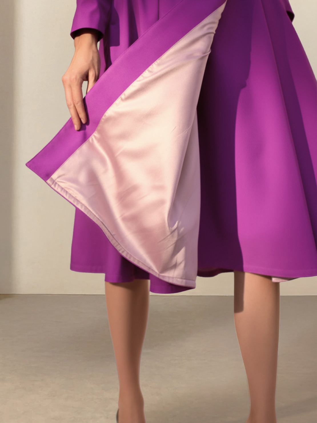 Water-repellent A-line hooded raincoat with insulated lining and matching belt for women