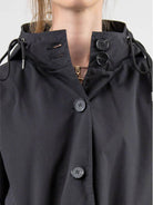 Water-resistant oversized hooded windbreaker rain jacket for outdoor activities