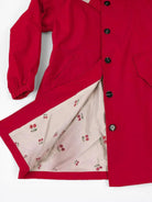 Water-resistant oversized hooded windbreaker rain jacket with multiple pockets and windproof design