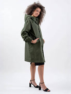 water-resistant oversized hooded windbreaker rain jacket with multiple pockets and adjustable waist